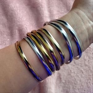 ( Steel) Set of Gorgeous Gold and silver tone steel  Bracelets ( seven  Pieces)